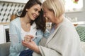 Woman shares the happy news with her mother