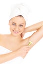 Woman shaving armpit Royalty Free Stock Photo