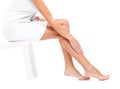 Woman shaving legs Royalty Free Stock Photo