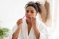 Woman Shaving Moustaches Removing Facial Upper Lip Hair In Bathroom