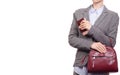 Woman in shirt and jacket holding a mobile phone and purse handbag business Royalty Free Stock Photo