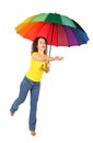 Woman in shirt with multicolored umbrella