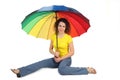 Woman in shirt with multicolored umbrella