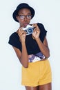 Woman, shocked and photographer in portrait in studio, creativity and talent for artist in creative job. African person