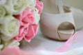 Woman shoes and bouquet