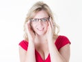 Woman in shop optician trying eyeglasses