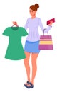 Woman with shopping bag holding dress. Clothing store customer Royalty Free Stock Photo