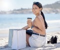 Woman with shopping bag, portrait and relax on beach after retail therapy, fashion and rest with coffee. Female outdoor