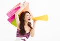 Woman with shopping bags and holding megaphone Royalty Free Stock Photo