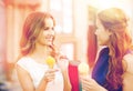 Woman with shopping bags and ice cream in city Royalty Free Stock Photo