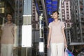 Woman With Shopping Bags Looking At Window Display Royalty Free Stock Photo