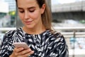 Woman and shopping bags smile with a cup of coffee and using mobile phone. Royalty Free Stock Photo