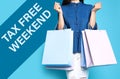 Woman with shopping bags and text TAX FREE WEEKEND on background, closeup Royalty Free Stock Photo