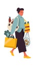 Woman with shopping bags. Young female walking from greengrocer store. Heavy handbags of food, buying fruits and