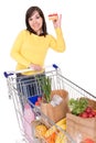 Woman with shopping cart Royalty Free Stock Photo