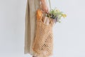 Woman shopping eko style string bag vegetables Royalty Free Stock Photo