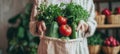 Woman shopping for fresh produce at farmers market using eco friendly cotton tote bag Royalty Free Stock Photo