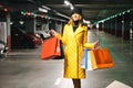 Woman after shopping going to her car at the parking lot Royalty Free Stock Photo