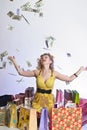 Woman with shopping and money Royalty Free Stock Photo