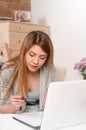 Woman shopping online with credit card and computer. Royalty Free Stock Photo