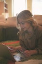 Woman shopping online with her credit card. Royalty Free Stock Photo