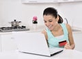 Woman shopping online at home Royalty Free Stock Photo