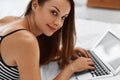 Woman Shopping Online. Smiling Girl Using Laptop Computer At Home Royalty Free Stock Photo