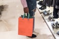 Woman shopping in a shopping center with bags