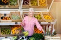 Woman shopping in small grocery store Royalty Free Stock Photo