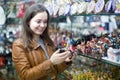 Woman shopping in souvenir store Royalty Free Stock Photo