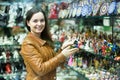 Woman shopping in souvenir store Royalty Free Stock Photo