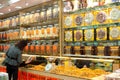 A woman shopping at traditional store of dry food