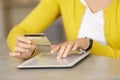 woman shopping using tablet pc and credit card Royalty Free Stock Photo