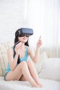 Woman shopping by VR headset Royalty Free Stock Photo