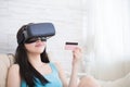 Woman shopping by VR headset Royalty Free Stock Photo