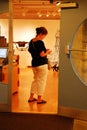 A woman shops in an art gallery in Alexandria, Virginia