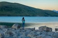 Woman on Shore of Lake Tekapo