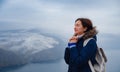 woman on shore of North sea on cold winter day. Royalty Free Stock Photo