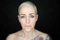 Woman with short hair and tattoos Royalty Free Stock Photo