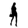 Woman in short summer dress walking with small handbag on her shoulder, isolated vector silhouette, side view