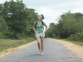 Woman In Shorts Walking Barefeet On Rural Road Royalty Free Stock Photo