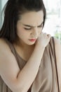 Woman with shoulder pain or stiffness Royalty Free Stock Photo