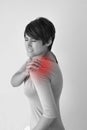 Woman with shoulder pain or stiffness Royalty Free Stock Photo