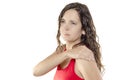Woman with shoulder pain or stiffness, her hand in her shoulder. Royalty Free Stock Photo