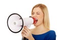 Woman shouting with a megaphone