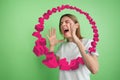 Woman shouting, screaming on studio background. Sales, offer, business, cheering fun concept.