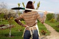 Woman with shovel in garden Royalty Free Stock Photo