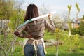 Woman with shovel in garden Royalty Free Stock Photo