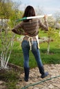 Woman with shovel in garden Royalty Free Stock Photo