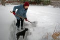 Woman shoveling snow Royalty Free Stock Photo